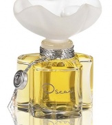 Oscar de la Renta once dreamed of creating a perfume that in one drop captured all of the joy and sophistication of his designs. As a child, Oscar imagined that the fragrance of a flower could be caught in a drop of morning dew. He designed the Oscar bottle to symbolize this precious essence of flowers. Made in France. .25 oz. 