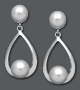 Cultivate your look. These stunning teardrop-shaped earrings features a smooth sterling silver setting with a cultured freshwater pearl post and drop (6-8 mm). Approximate drop: 1-1/8 inches.