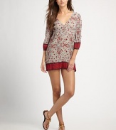 Chic crepe provides the luxe backdrop for this design featuring complementary paisley and floral prints.V-neckKeyhole necklineThree-quarter elasticized sleevesContrasting trimPull-on styleCottonMachine washImported