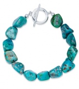 Add a touch of turquoise. Avalonia Road's pretty toggle bracelet features asymmetrical nuggets of turquoise (21 ct. t.w.) in sterling silver. Approximate length: 7-1/2 inches.