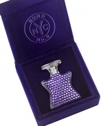 The mini-bejeweled star is encrusted in Swarovski crystals and filled with Central Park West eau de parfum. Includes a velvet jewel box. 0.17 oz. Made in USA. 