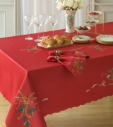 With a rich red hue and daintily scalloped edges, this Lenox runner puts a festive, feminine touch on wintertime tables. Swirling ribbons and sprigs of holly set the scene for delectable Christmas dining.