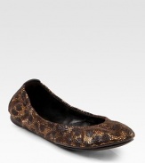 EXCLUSIVELY AT SAKS. Textured metallic leather in a wildly chic leopard print, backed by a signature logo at the heel. Leather and leopard-print metallic leather upperLeather liningRubber solePadded insoleImported