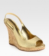 Soft metallic leather adds luster to a natural cork wedge. Cork wedge, 4 (100mm)Covered platform, ½ (15mm)Compares to a 3½ heel (90mm)Metallic leather upperLeather lining and solePadded insoleImportedOUR FIT MODEL RECOMMENDS ordering true size. 