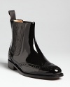 Burberry puts its signature polished, luxurious craftsmanship into these Chelsea booties that are spot-on in terms of the menswear trend, with oxford detailing.