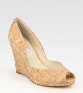 Low-cut peep toe in wonderfully textured cork, grounded by a substantial wedge. Cork wedge, 3½ (90mm)Cork upperLeather lining and solePadded insoleImported