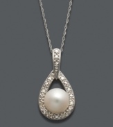 Illuminate your neckline with this sweet style by Belle de Mer. A cultured freshwater pearl (8-9 mm) is cradled inside an open-cut teardrop accented by sparkling diamonds. Setting and chain crafted in 14k white gold. Approximate length: 18 inches. Approximate drop: 7/8 inch.