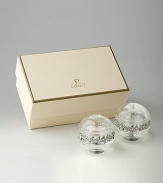 These elegant crystal spheres are embraced by an intricate garland band detailed with Swarovski crystals. Also available with gold-plated band. Lead-free crystal Platinum-plated band Gift boxed Imported