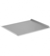 Welcome to a world of baked greats! Perfect for cookies, dinner rolls, pastries and beyond, this large cookie sheet features two upturned ends for easy lifting and open sides, so food slides right off. Crafted with a heavy-gauge steel core for even heating, this pan features two interlocking layers of professional nonstick for gentle release. Lifetime warranty.