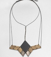 From the Facet Collection. This head-turning statement necklace suspends a grouping of diamond-shaped discs of antiqued and powder-coated brass from a network of gunmetal chains.BrassLength, about 14½Lobster claspMade in USA