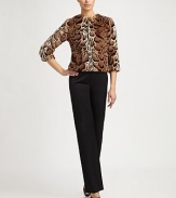 Plush faux fur, in a boxy silhouette patterned with an exotic animal print.Jewel necklineThree-quarter sleevesShoulder zipperAbout 21 from shoulder to hem79% acrylic/21% cottonDry cleanImported of French fabricModel shown is 5'11 (180cm) wearing US size 4. 