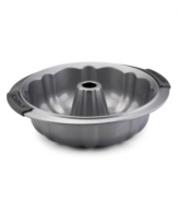 Beautify your bundts with the Anolon 9.5 fluted mold pan! New proprietary coating ensures superior release and makes cleanup a snap. Silicon-enhanced handles are steady and slip-free, while the pan's substantial weight provides durability and helps prevent warping.