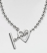 An open heart, etched with the Gucci name, on a bold ball chain with toggle closure, crafted of polished sterling silver. Sterling silver Chain length, about 16¼ Pendant length, about ¾ Toggle closure Made in Italy