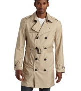 Lightweight and packable, this double breasted trench classic folds into itself and features water resistant fabric construction so you can brave the elements in style.Point collar with hook-and-eye Epaulettes Double breasted button front Single gun flap Long sleeves with belted cuffs Dual side pocketsBuckled belt Storm flap One inside zip pocket Fully lined About 35½ from shoulder to hem Polyester; hand wash Imported