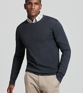 A classic crew neck sweater in a slim silhouette by Theory is rendered in a lush gray-blue.