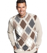 Clearly a classic. The argyle pattern of this Oscar de la Renta sweater gives your style a timeless touch.