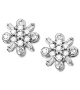 Springtime sparkle. These luminous stud earrings feature round and baguette-cut diamonds (1/4 ct. t.w.) in the shape of flowers. Set in 14k white gold. Approximate diameter: 2/5 inch.