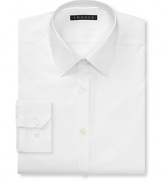 Solid dress shirt with spread collar, two button mitered cuffs. Modern fit through the body.