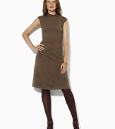 The quintessential sweater dress is jersey-knit in extra-fine merino wool and finished with a rolled neckline and flirty cap sleeves for season-spanning style.