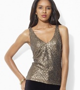 All-over glistening sequins lend an eye-catching allure to the Verra tank, crafted with a dramatic v neckline at the front and back for an effortlessly festive finish.