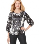 Of a fashionable feather: T Tahari creates a gorgeous peacock-printed blouse that style mavens are sure to flock to. Pair with slim dark pants and heels for a flawless office look! (Clearance)