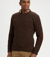 A refined crewneck silhouette channels authentic heritage in a classic tweed construction.CrewneckRibbed knit collar, cuffs and hemCottonDry cleanImported