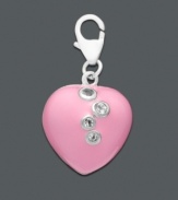 You can never go wrong with a little pink. Add sparkle and color with this bold pink heart charm with crystal accents. Set in sterling silver with a lobster claw clasp. Approximate diameter: 1/2 inch.