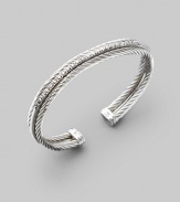 From the Silver Ice Collection. Two twisted cables of sterling silver, divided by a band of pavé diamonds set in white gold. Diamonds, 0.49 tcw Sterling silver & 14k white gold Cable, 3mm Diameter, about 2½ Made in USA