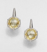 Beautifully faceted canary crystal stones set in intricately designed, sterling silver. Canary crystalsSterling silverWhite sapphiresSize, about .75Lever backImported