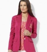 Lauren by Ralph Lauren tailored a chic jacket in sleek stretch cotton sateen with a signature embroidered crest for a preppy look.