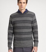 A new classic, a merino-wool knit sweater with a brilliant pattern.CrewneckPull-on styleMerino woolDry cleanImported