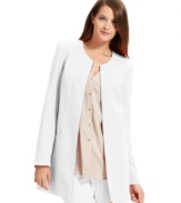 This structured jacket from Calvin Klein is designed with a collarless neckline that emphasizes the minimalist styling.