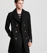 With an elongated silhouette, this leather-trimmed peacoat updates the classic for a sophisticated addition to your refined wardrobe.