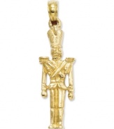 Stand attention in style! This charming toy soldier charm features a 3D design in 14k gold. Chain not included. Approximate length: 1-1/10 inches. Approximate width: 3/10 inch.