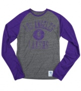 Rush the court! Be a part of the team victory with this Los Angeles Lakers NBA raglan shirt from adidas.