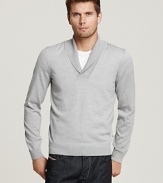 A dynamic layering piece for cold weather, this soft wool sweater is set apart by a deep V neck shawl collar.