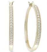 Up your glam factor. Yell'Ora's trendy hoop earrings showcase round-cut diamonds front and center (1/2 ct. t.w.). Base metal made from a combination of pure gold, sterling silver and palladium. Approximate diameter: 1-1/10 inches.