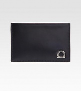 Italian calfskin leather card case with signature gancini ornament detail.Three card slotsLeather4W x 3HMade in Italy