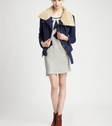 A chic update to a casual classic, in luxe linen with cozy faux-shearling accents, bold buckles and a unique circle hem.Detachable foldover faux-shearling collarLong sleeves with cuffsAsymmetrical zip front closureBuckle closures at collar and hemFront slash pocketsAbout 24 from shoulder to hemBody: linenFaux-fur trim and lining: 60% acrylic/40% polyesterDry cleanImported of French fabricModel shown is 5'11 (180cm) wearing US size Small. 