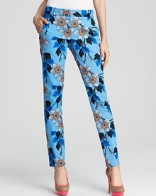 Touch upon tropical style in these Theory floral-print pants, alive with vivid hues and playful sensibility. The trend-right look is perfected with a tissue-thin tee and nude pumps for a summer-ready lift to your latest capsule collection.