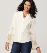 Channel the enduring style of an era gone by with this lace cuff, bell sleeve blouse by Lucky Brand Jeans. A few simple accessories are all you need to complement this beautiful silk-blend top.