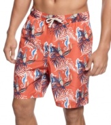 Dressed for exploration. Bring the underwater adventures to land with these fun, seahorse print swim trunks from Club Room.