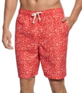 Stay stylish even in the sun with these preppy, bandana-patterned swim trunks from Club Room