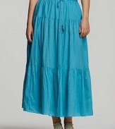 DKNYC's go-anywhere, works-with-everything maxi skirt brings ease to your favorite summer looks.