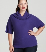 Dazzling crystal buttons on the sleeve lend a touch of glamour to the relaxed silhouette of this Jones New York Collection cashmere sweater.