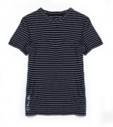 Line up for style. This striped t-shirt from Armani ups your casual cool.