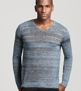 Muted gray and light blue stripes add depth to a fashion-forward slim fit sweater from Theory.