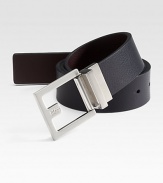 An essential, reversible design fit for any look with a brushed silvertone buckle. About 1¼ wide Imported