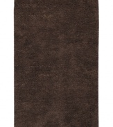 Step onto a cloud-soft area rug in chocolate brown wool. Offering one of the thickest, plushest hands in the industry, the Surya Metropolitan area rug billows with softness in every space.