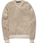 Lock down the season's best look with this smart V-neck sweater from Sean John.